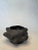The studio art pottery planter has an abstract modern shape and is adorned with soft protrusions throughout it's squatty...