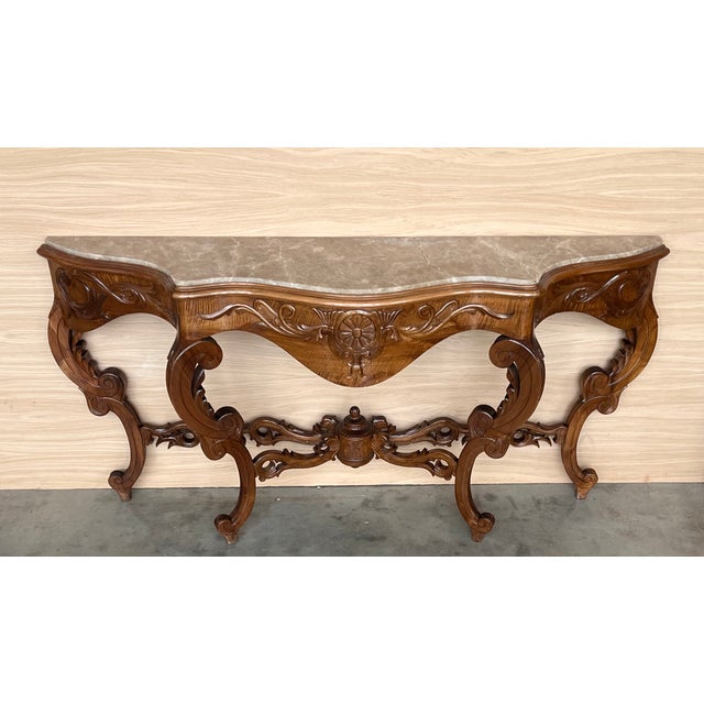 20th French Regency carved walnut console table with gilted edges 20th century French Regence style beautifully carved...