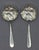 Pair of S. Kirk & Sons sterling silver repousse bon bon spoons, 1924. Shaped bowls decorated with berries & bright cut...