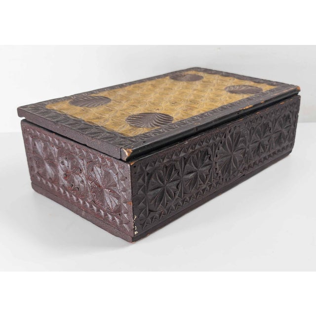 We are selling this really interesting and unusual Folk art chip carved box. This box has polychrome lid with unique...