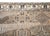 A wonderful vintage Persian Bakhtiari rug with a wonderful geometric patchwork pattern of myriad flowers and vines...