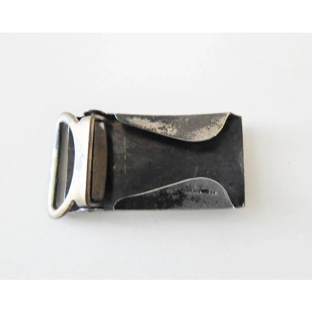 Vintage circa 1950's engraved sterling silver buckle. Overall foliate design with a small blank area that you could have...