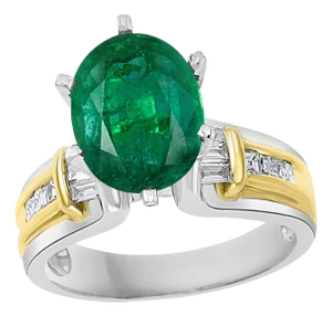 5.5 Carat Oval Cut Emerald and Diamond in 18 Karat/Platinum Two-Tone Ring Estate