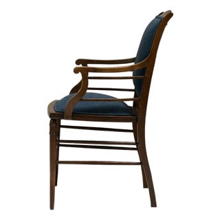 19th Century English Dark Wood Armchair With Navy Upholstery, Sunburst Inlay and Turned Legs For Sale