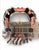 A striking decorative lampshade featuring a bold zebra motif rendered in plush velvet against a rich coral-rose ground....