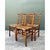 This set of four vintage bamboo-style wood and cane chairs beautifully captures the whimsical elegance of faux bamboo...
