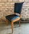 Set of Six (6) leather French Mid Century dining chairs, in the style of Andres Arbus. These art deco dining chairs are...