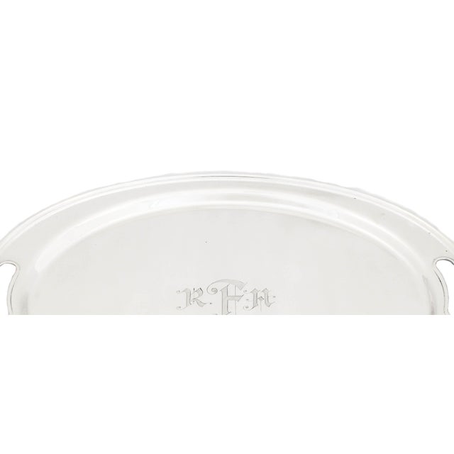 A sterling silver (tea) tray being offered for sale. Large with a heavy gauge, it has cutout handles on each end so it’s...