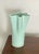 Trendy mint green color modern ceramic scalloped vase - beautiful with our without flowers One side is flat, the other has...