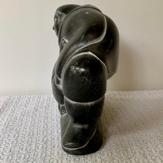 Inuit Soapstone Carving by Lucassie Amm – Signed - Kneeling Inuk Figure For Sale - Image 11 of 18