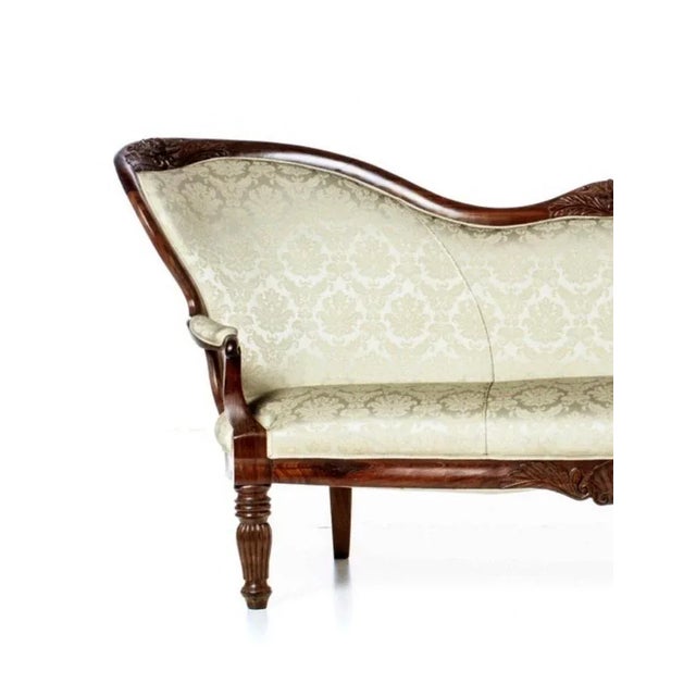 Romantic canape French, 19th century in Oilwood. Upholstered seat and back, decorated with floral motifs. Usage signs....