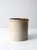 An antique American stoneware crock featuring a natural glaze with subtle tonal variation across the surface. The softly...