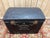 Military travel trunk with a domed lid, 19th century, identified by a stenciled inscription in white letters: "Captain...