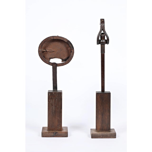 Rolf hans frankfurt 1938 - 1996 basel mask xii, 1988 statue ii, 1991 2 iron sculptures each signed, dated, and titled on...