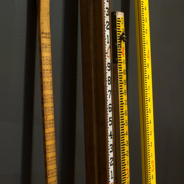 ABOUT The other wider all wood yellow surveyor pole is fixed. The logging measuring stick is numbered on 4 sides and has a...