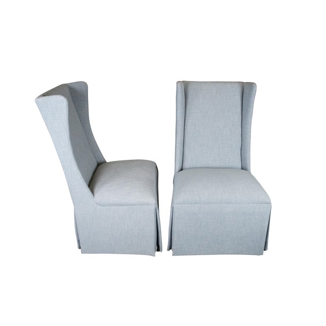 4 Gabby Home SCH-D693 Cumberland Armless Dining Chairs. Features a high wingback over padded seat and skirted base....