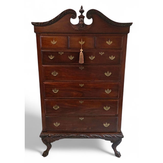 This Late 19th Century Colonial Revival Chippendale-Style Mahogany High Chest with Side Panels is a richly detailed,...