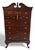 This Late 19th Century Colonial Revival Chippendale-Style Mahogany High Chest with Side Panels is a richly detailed,...