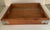 Solid stained wood tray with polished nickel shaped bracket accents on corners. Has cut out handles for ease of use and is...