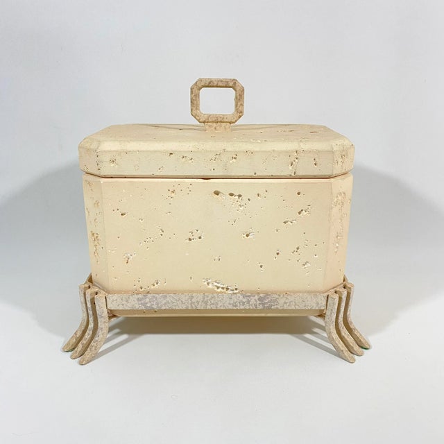 Postmodern faux travertine ceramic box with textured finish. This box has substantial weight and appearance. The metal...