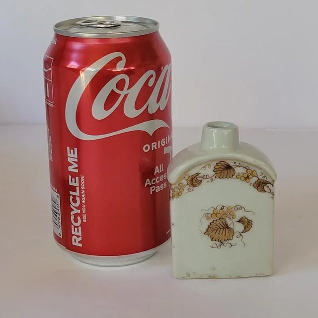 Chinese miniature porcelain tea caddy with gold decoration. All the gold painting is intact and shows no wear which is...