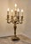 Pair of five-armed bronze candlesticks in the Louis XV rococo style. Richly decorated with plastic acanthus ornament,...