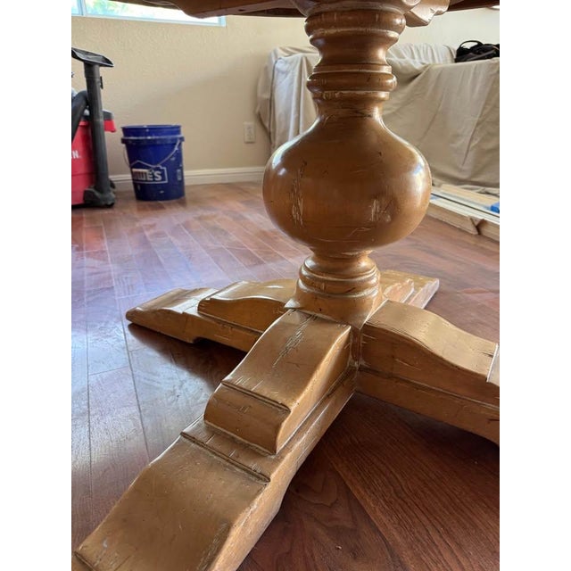 Up for sale is an authentic, investment-grade Guy Chaddock & Co. round pedestal dining table from their highly coveted...