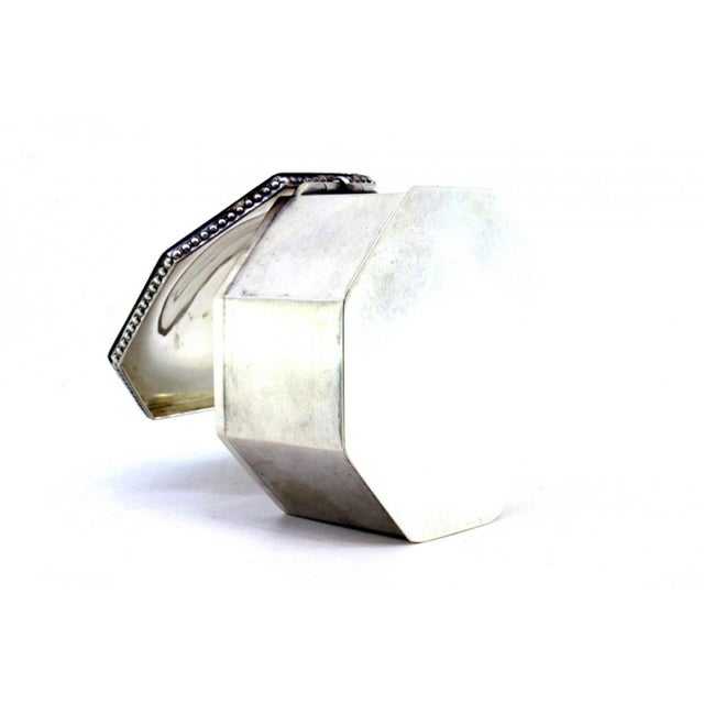 Octagonal Silver Box with Pearls Hinged Lid, in Very Good conditions. Designed 1890 to 1919 This piece has an attribution...