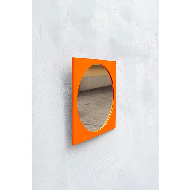 Mirror with polycarbonate frame. Model 4724/5 Designer Gino Colombini Manufacturer Kartell Year 1972 This piece has an...