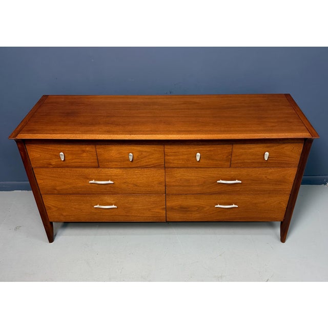 This John Van Koert for Drexel Profile K4 low dresser is a classic example of refined American Mid-Century Modern design....