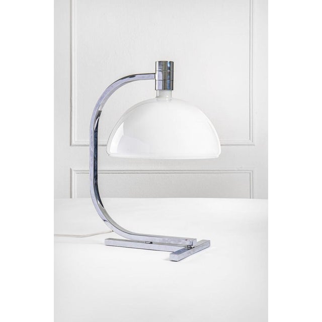 Chrome and glass table lamp model AS1N, designed by Franco Albini, Franca Helg e Antonio Piva Produced by Sirrah, Italy...