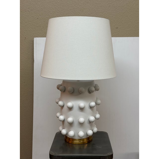 Design Plus Gallery present the Medium Linden Table Lamp: Visual Comfort. This plaster-white lamp has a distinctive...