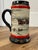 Susan Renae' Sampson (signed on the front)Design: Features a team of Budweiser Clydesdales pulling a red holiday wagon...