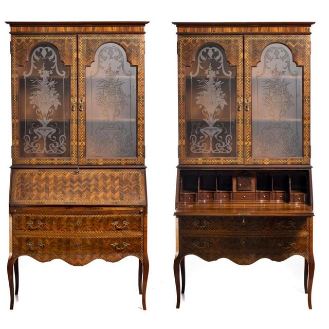 Display Cabinet with Elevator 20th-century Portuguese, made of rosewood with rosewood inlays. Elevator with two glazed...