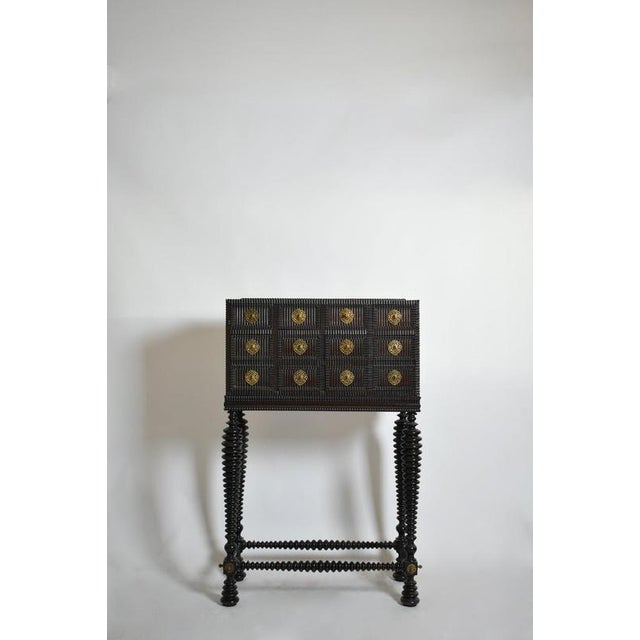 Turned wood cabinet, XIXth c. Height: 134 cm - 52.76 in Length: 88 cm - 34.65 in Width: 42 cm - 16.54 in
