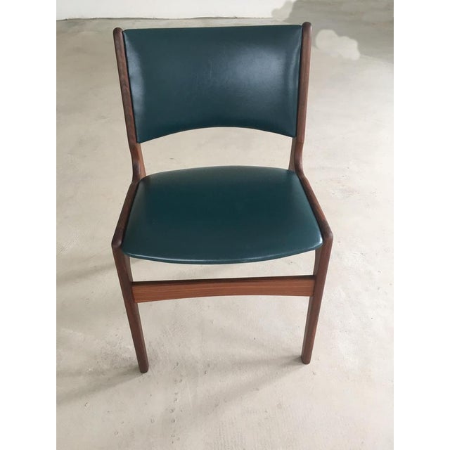 Set of eight restored Erik Buch dining chairs made by Anderstrup Møbelfabrik. The chairs are made in teak and feature a...