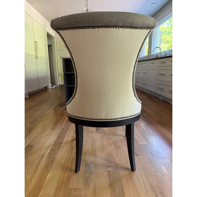 Bernhardt Silhouette side chairs, 10 available—upholstered tall back dining chair. The front fabric is light gray, and the...