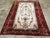 A French Inspired Vintage Turkish Anatolian accent carpet handmade during the Mid-20th century. Measures: 7' 2" x 9' 8"