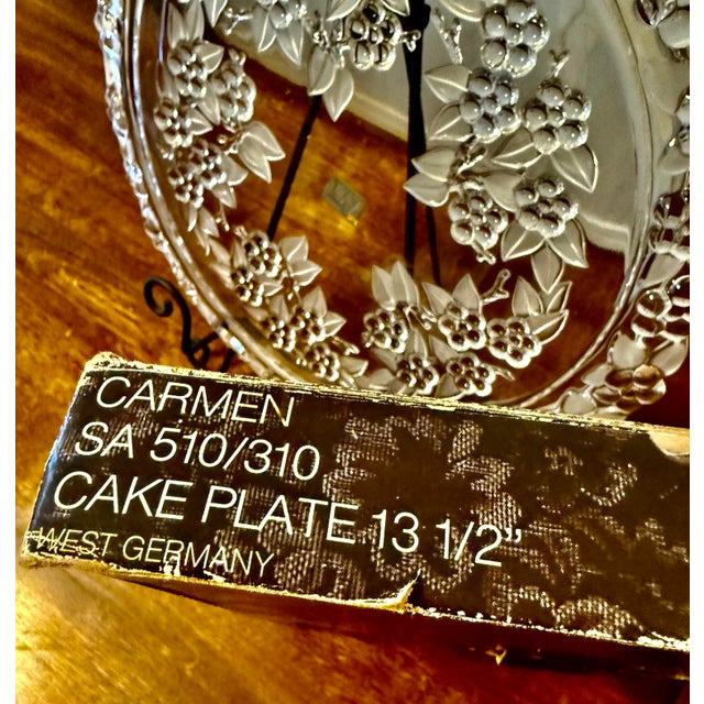 This is an elegant crystal cake plate, designed for serving desserts, appetizers, or as a decorative centerpiece. It...