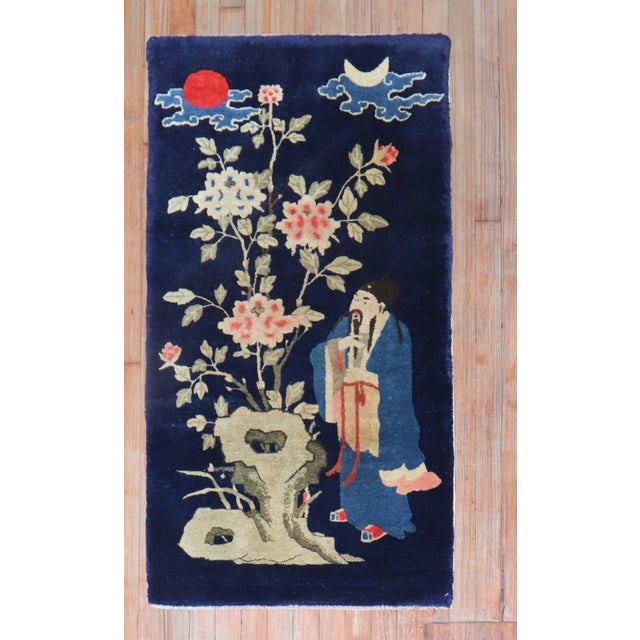 An early 20th-century Chinese Buddha rug. Measures: 2'3'' x 4'3''.