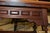 This is a solid & well made extending coffee table. Carved trim & turned spay legs. Side stretchers. The 2 ends extend...