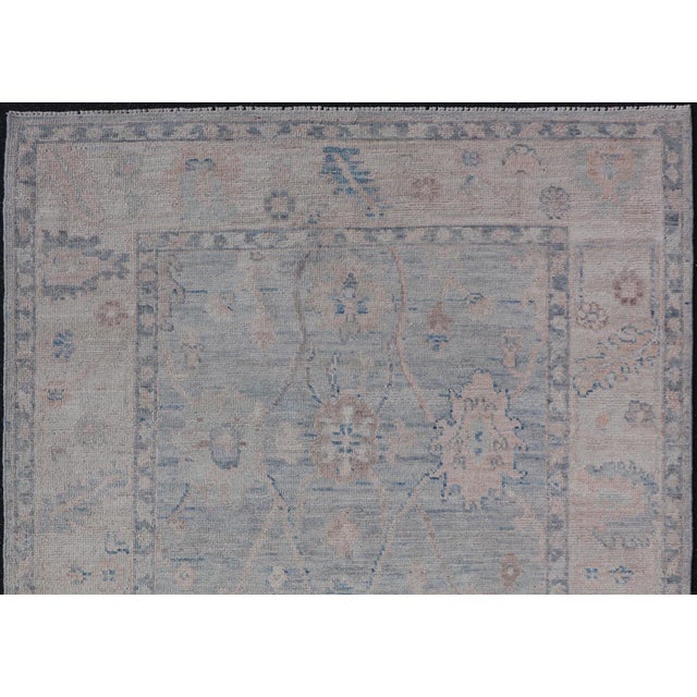 Textile Modern Tribal Oushak With a Cream Border and Light Gray-Blue Background 4'0 X 6'2 For Sale - Image 7 of 12