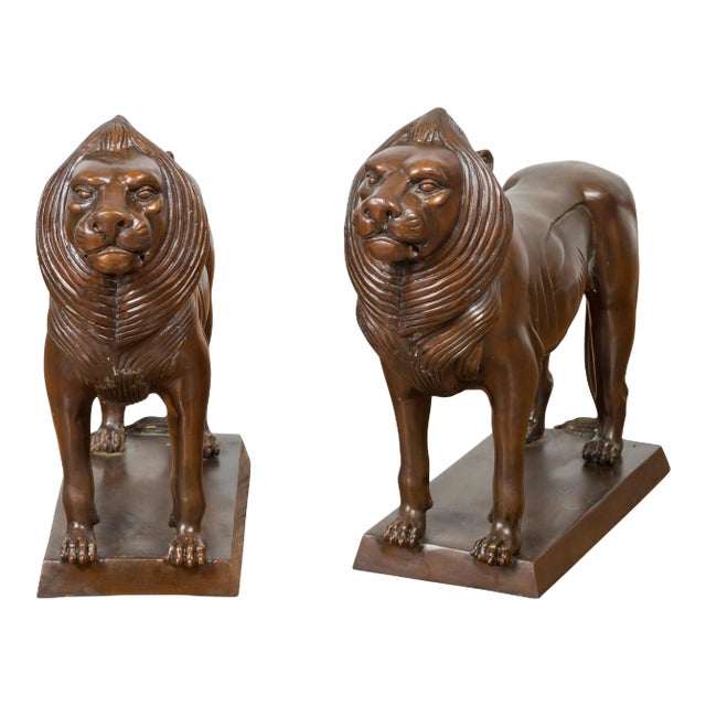 Vintage Bronze With Dark Patina Lion Sculptures on Bases - A Pair For Sale
