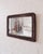 A rectangular wall mirror with a fully wrapped pinecone frame, composed of densely applied natural elements over a wood...