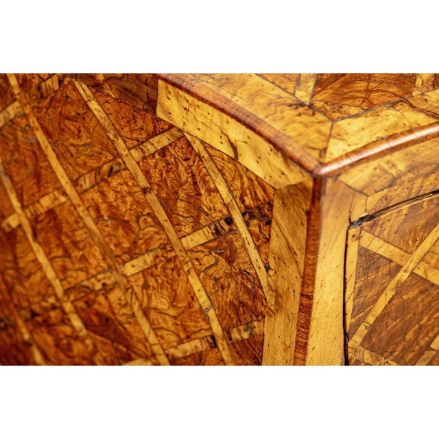 A well made and highly decorative pair of Italian Parquetry Rococo style commodes. Very well crafted with warm-toned...
