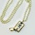 Ivory 1990s Vintage Chippendale Art Deco Nutcracker Babble on Faux Pearls Christmas Pendant Necklace, 40” For Sale - Image 8 of 17
