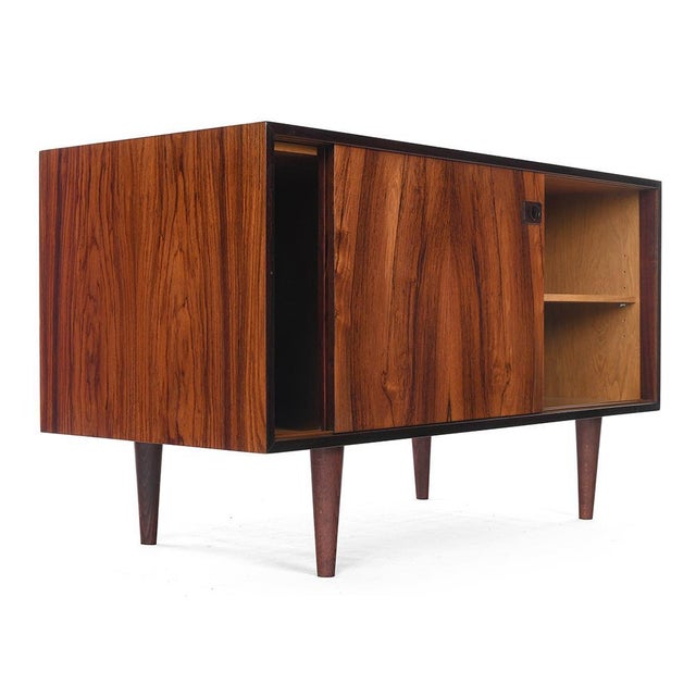 Wooden console from the 1960s. Vintage wooden storage cabinet. It has 2 wooden cupboards. This piece of furniture was...
