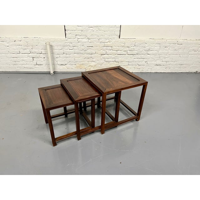 80's vintage rosewood nesting tables with more of a mid-century modern feel than a traditional asian style which was the...