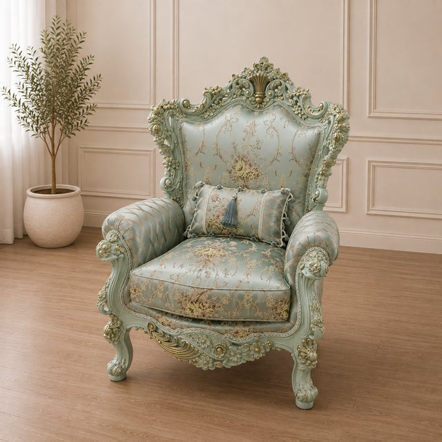 Elevate your living space with this elegant French Louis XV-style armchair, featuring a beautifully sculpted sky blue...