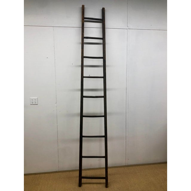 Antique French rustic farmhouse ladder with a desirable chipped patina finish to wood. Recommended for decorative use...